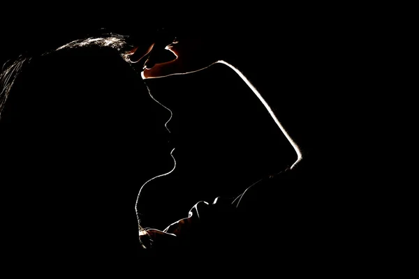 stock image Silhouette of a young woman face