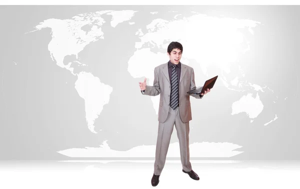 Young businessman with world map — Stock Photo, Image