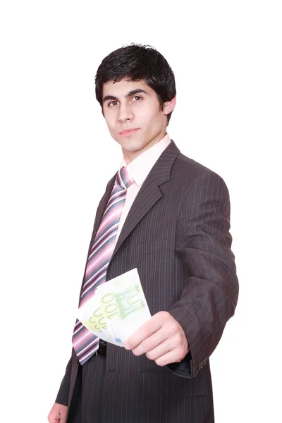Zakenman houdt geld in een hand — Stockfoto