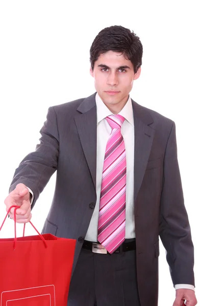 Młody człowiek z torbami na zakupy — Zdjęcie stockowe