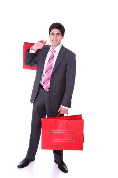Hombre guapo con bolsas de compras — Foto de Stock