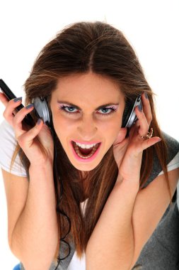Cool teenager listening to music and dancing