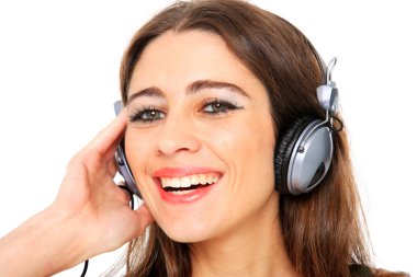 Cool teenager listening to music and dancing