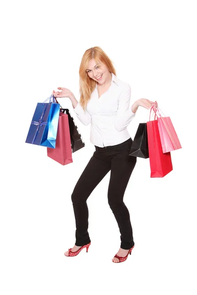 Mulher feliz com sacos de compras — Fotografia de Stock