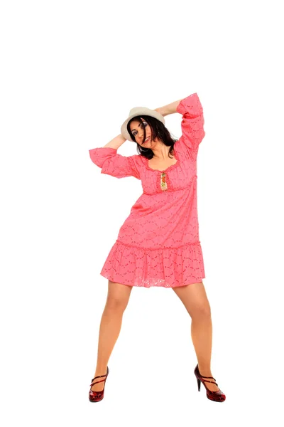 Gyönyörű fiatal nő, fárasztó egy rózsaszín ruha — Stock Fotó
