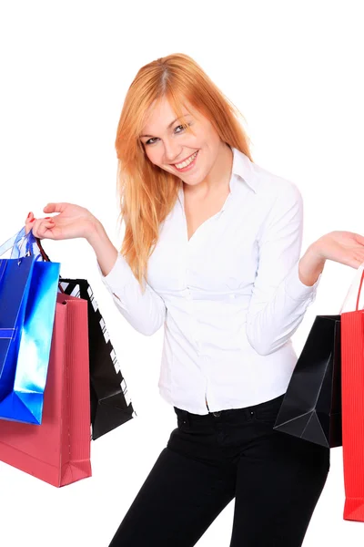 Young woman with lots of shopping bags — Stock Photo, Image