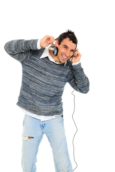 Young man listening to music — Stock Photo, Image