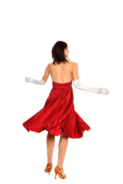 Jeune femme en robe rouge et gants blancs — Photo