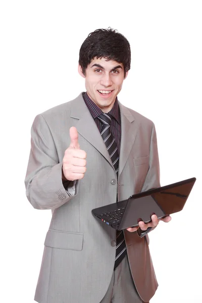 Atraktivní podnikatel pomocí jeho laptop — Stock fotografie