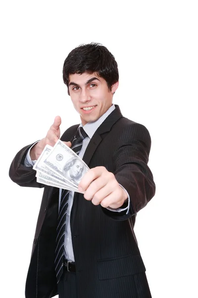 Affärsman håller pengarna i en hand — Stockfoto