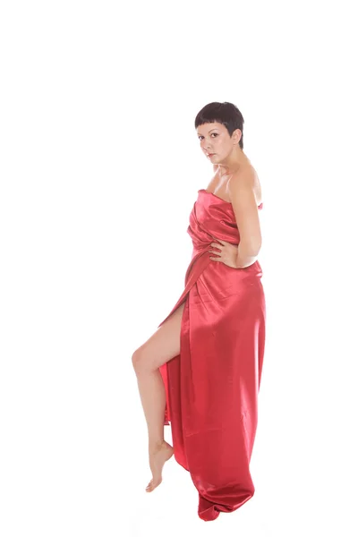 Vacker ung kvinna i röd lång klänning — Stockfoto