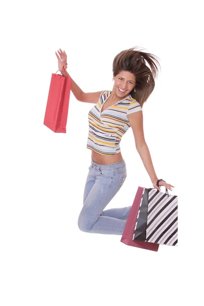 Ugrás a bevásárló szatyrok nő — Stock Fotó