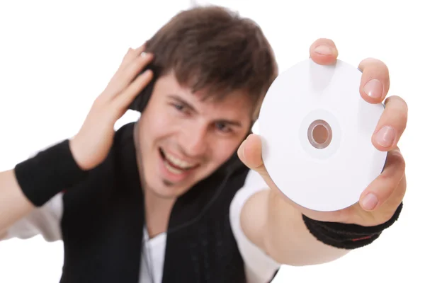 Молодой парень держит компакт-диск — стоковое фото