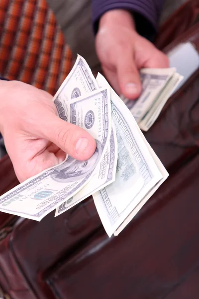 Money in a businessman hands — Stock Photo, Image