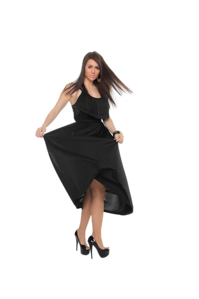 Досить сексуальна дівчина повна довжина позує в гарній чорній сукні — стокове фото