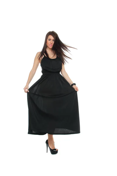 Menina muito sexy comprimento total posando em um vestido preto agradável — Fotografia de Stock