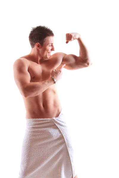 Hermoso hombre musculoso con la toalla . — Foto de Stock