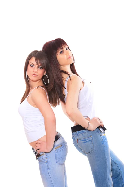 Two girls in jeans and white tshirt — Stock Photo, Image