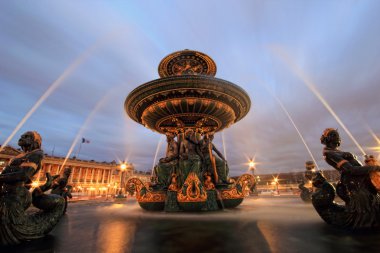 Fountain at Place de la Concord by dusk clipart