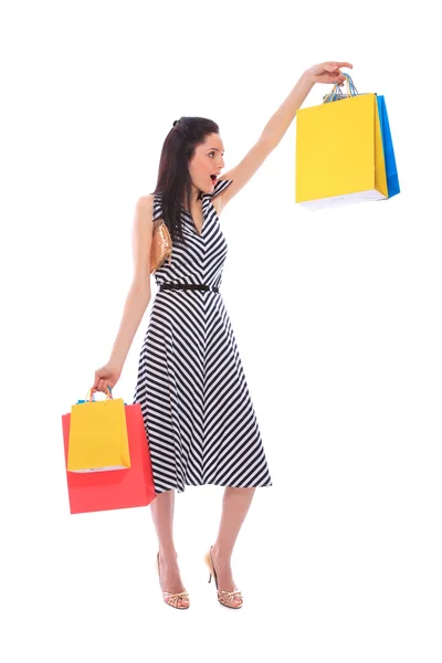 Chica joven de moda con una bolsa de compras — Foto de Stock