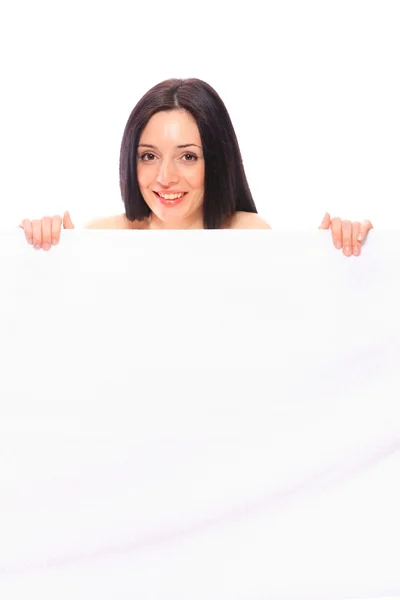 Vrouw onder handdoek — Stockfoto