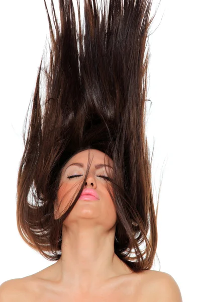 Retrato de uma menina bonita com cabelo voador — Fotografia de Stock