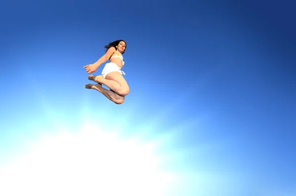 Jonge vrouw springen op een strand — Stockfoto