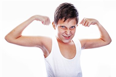 Young boy flexing biceps clipart