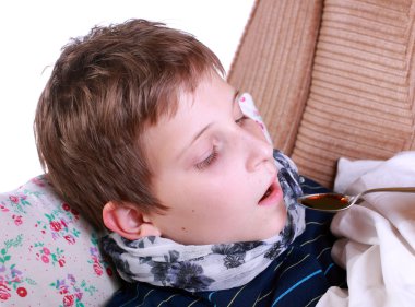 Sick child accepts medicine clipart