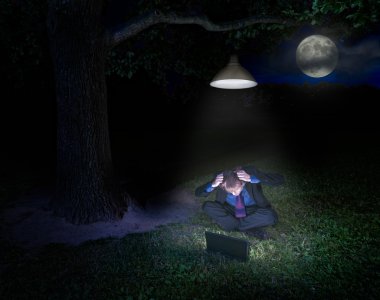 Frustrated young man with laptop in forest clipart