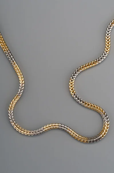 Woman golden chain — Stock fotografie