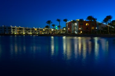 Red Sea resort at night clipart