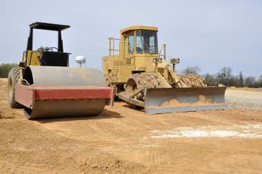 Road roller and compactor clipart