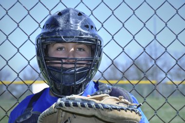 Young baseball catcher clipart