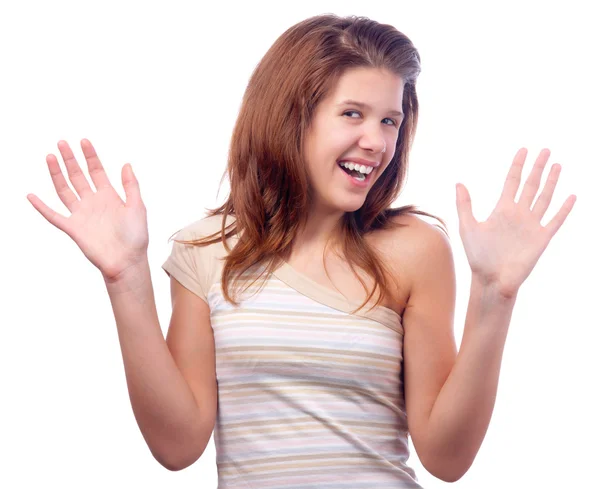 Chica bonita sonriendo mientras sostiene sus manos en el aire aislado en blanco — Foto de Stock