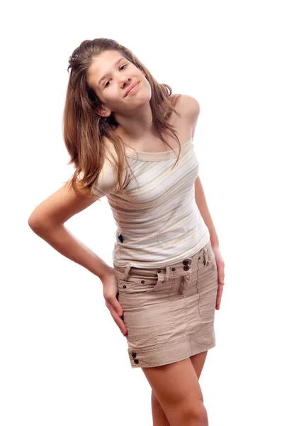 Piękne, uśmiechnięte nastolatka w skrócie brązowy spódnica — Zdjęcie stockowe