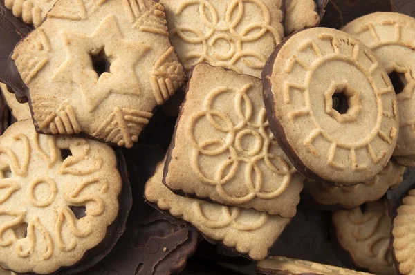 stock image Delicious chocolate tea biscuits in different shapes