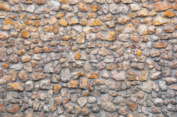 stock image Wall made of small colorful stones, suitable as background