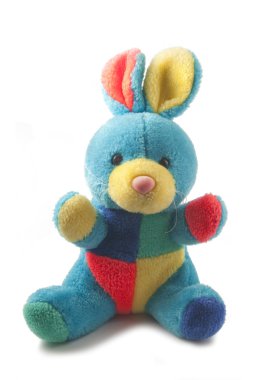 Fluffy colorful rabbit toy clipart