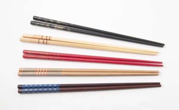 stock image Five pairs of chinese sticks for eating chinese food