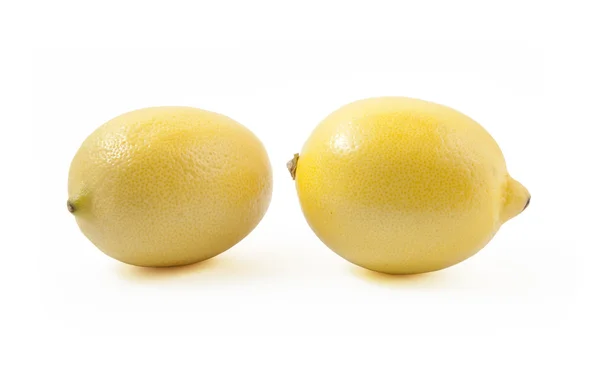 stock image Two beautiful round lemons isolated on the white background