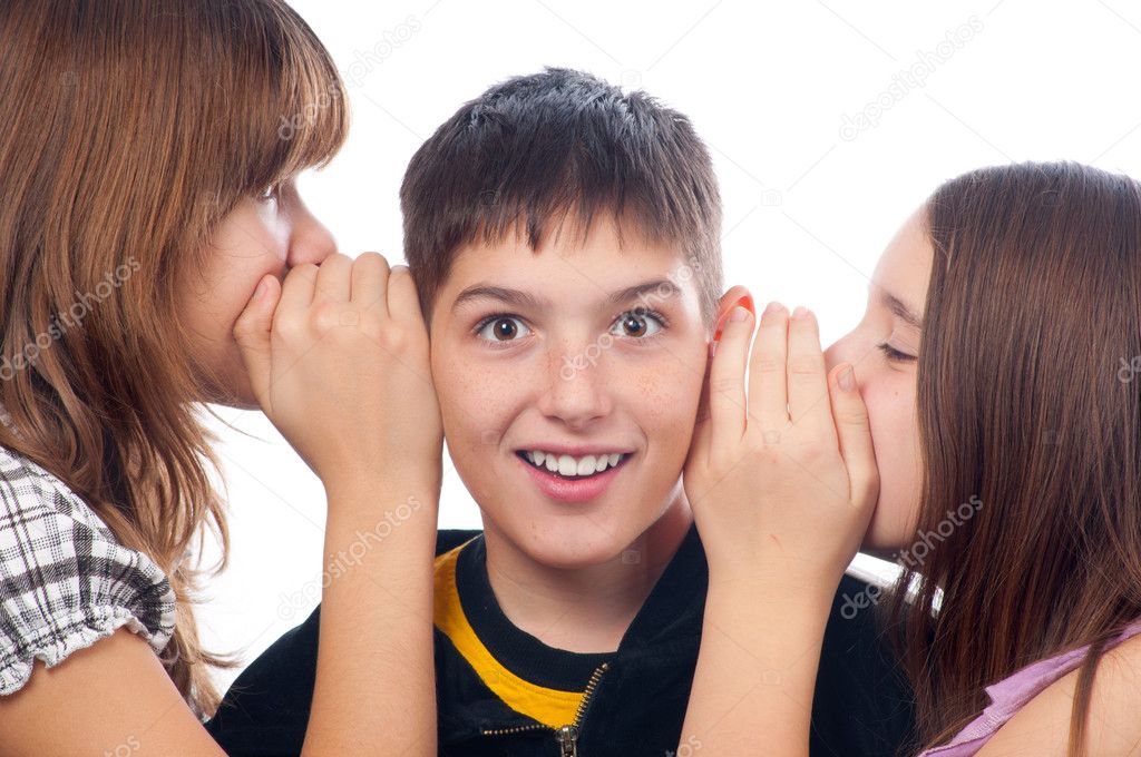 Two girls and a boy gossiping