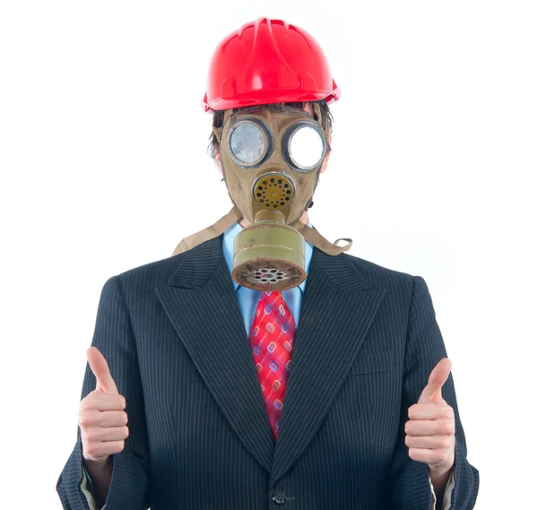Hombre de negocios con máscara de gas y casco aislado en blanco mostrando los pulgares hacia arriba —  Fotos de Stock