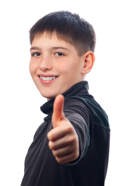Happy teenage boy showing thumbs up isolated on white — Stock Photo, Image