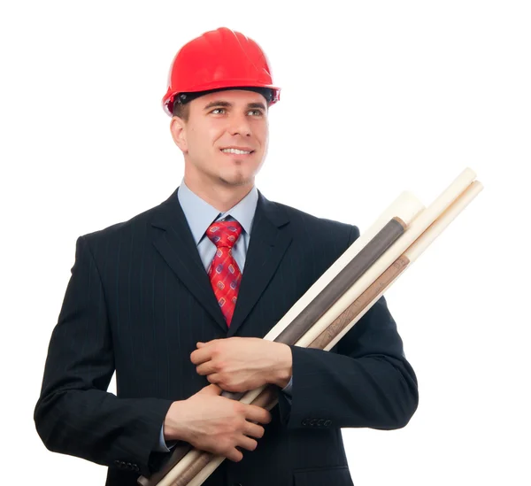 Bonito engenheiro sorridente com chapéu duro na cabeça e plantas em seus braços isolados em branco — Fotografia de Stock