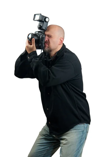 stock image Professional photographer taking photos isolated on white