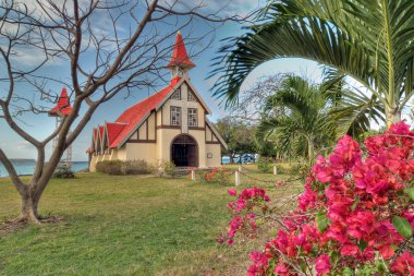 Red roofed church in Mauritius clipart