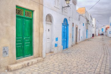 Colourful doors of Kairouan medina clipart