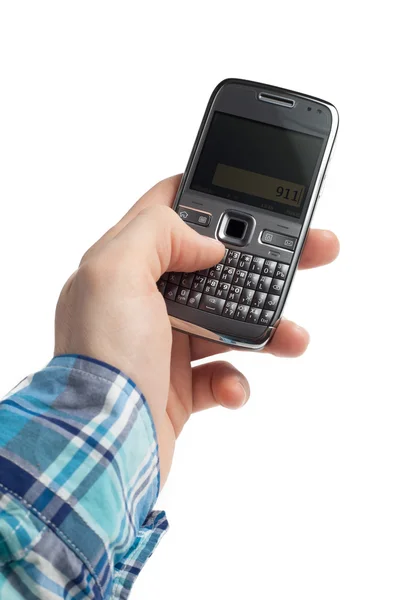 Telefonen i handen isolerad på vit Stockbild