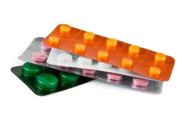 Pillen in blister geïsoleerd op wit — Stockfoto